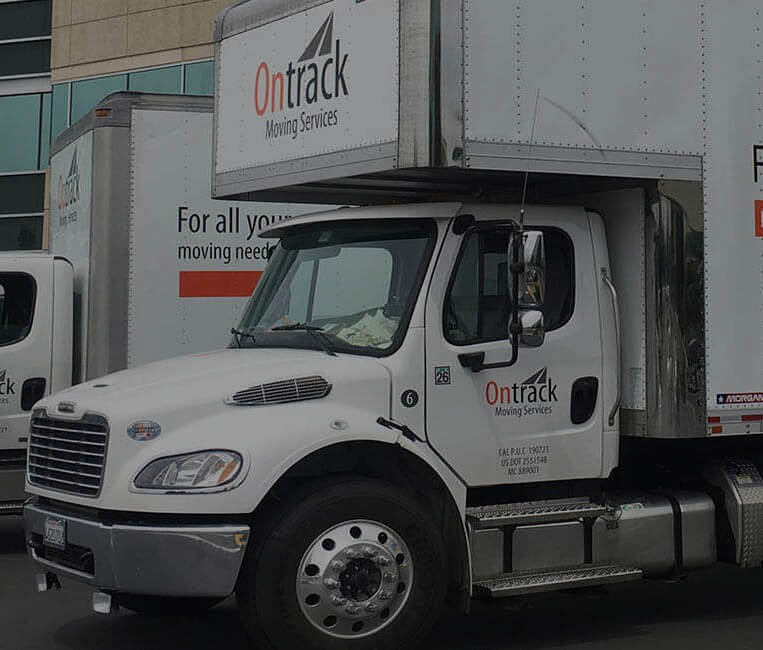 Ontrack Moving bobtail truck with USDOT 2551548 credentials at a Sunnyvale biotech campus for laboratory equipment pickup
