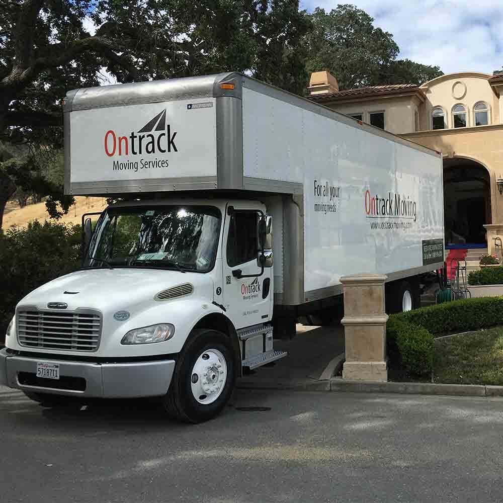 Ontrack Moving truck at residential home during loading