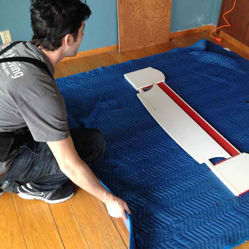 Ontrack Moving professional piano packing and wrapping
