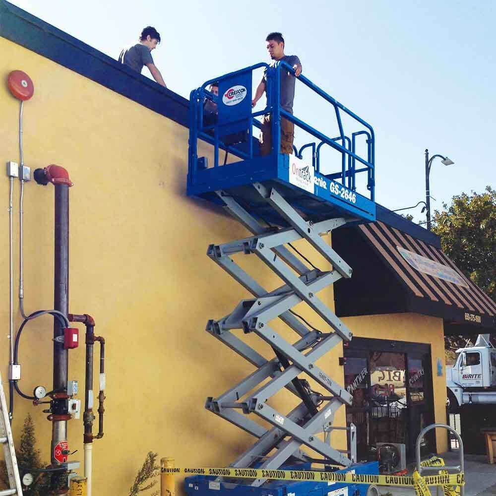 Ontrack Moving using scissor lift for commercial relocation